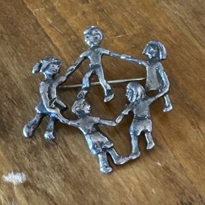 Vintage Mexican Sterling Silver Children Circle Brooch
